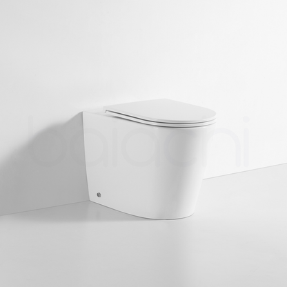 Ballina Rimless In Wall Toilet Suite with Round Stainless Steel Antique Bronze Flushing Buttons
