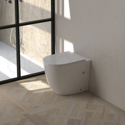 Baiachi Involution Rimless In Wall Tornado Toilet Suite with Round Stainless Steel Brushed Gold Flushing Buttons BTW2